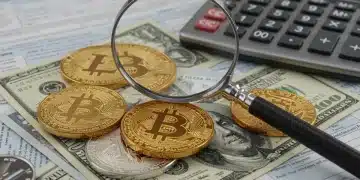 Cryptocurrency coins on dollar bills with tax forms, symbolizing new US crypto tax regulations for 2025.