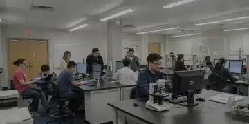 Students and teachers collaborating in a modern science lab, representing STEM education innovation.